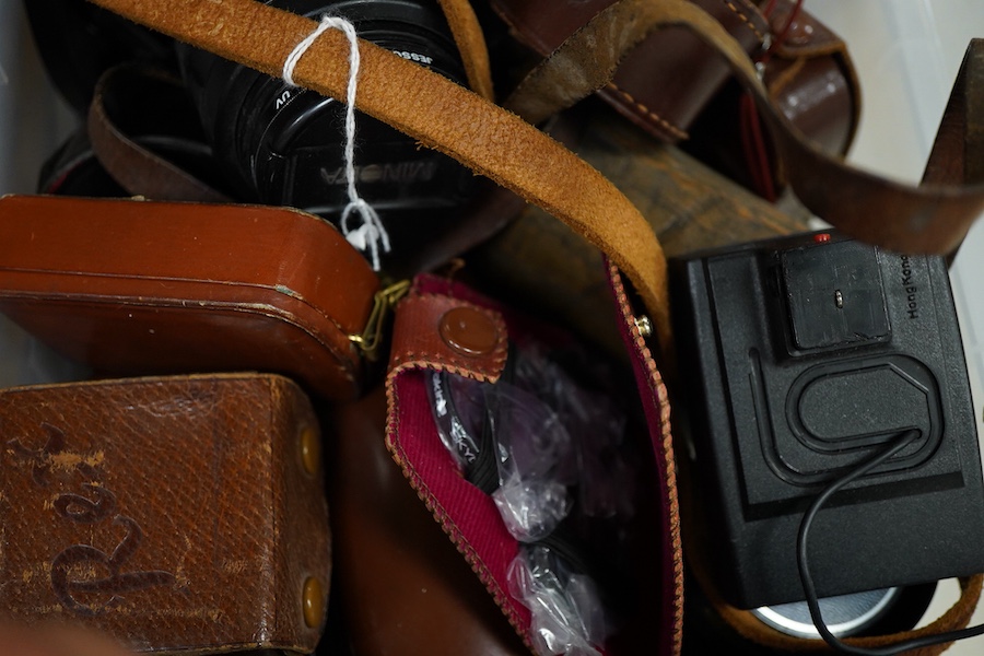 A collection of photography accessories including; two Konica lenses, a Minolta lens, a Makinon lens and a Tamron auto tele converter 2x K-EE